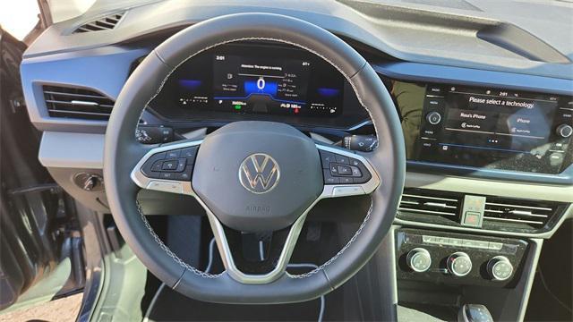 used 2023 Volkswagen Taos car, priced at $22,420