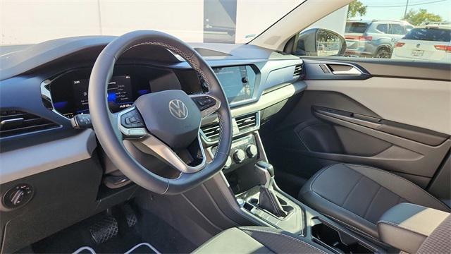 used 2023 Volkswagen Taos car, priced at $22,420