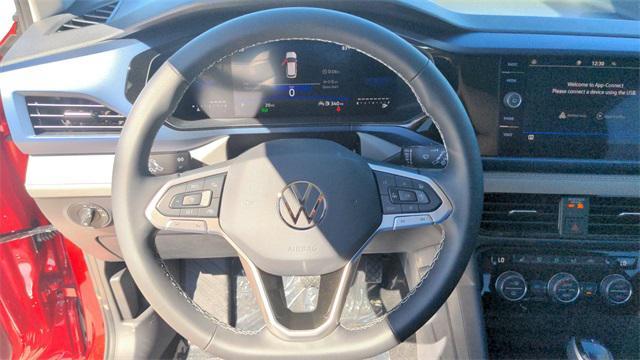 used 2024 Volkswagen Taos car, priced at $23,884