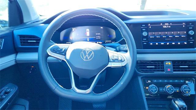 new 2024 Volkswagen Taos car, priced at $27,667