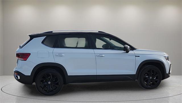 used 2024 Volkswagen Taos car, priced at $31,020
