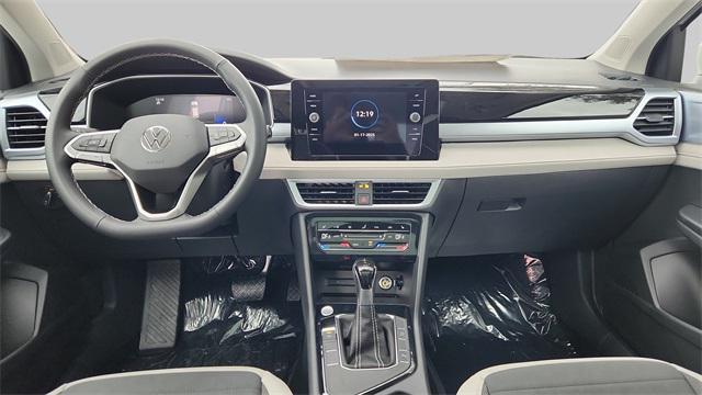 new 2025 Volkswagen Taos car, priced at $30,969
