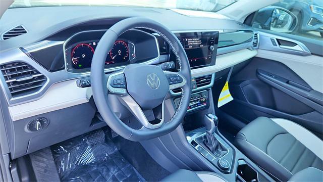 new 2025 Volkswagen Taos car, priced at $34,714