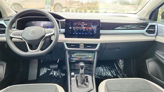 new 2025 Volkswagen Taos car, priced at $29,291