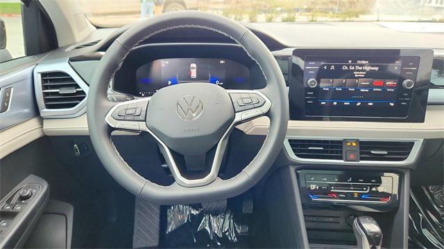 new 2025 Volkswagen Taos car, priced at $29,291