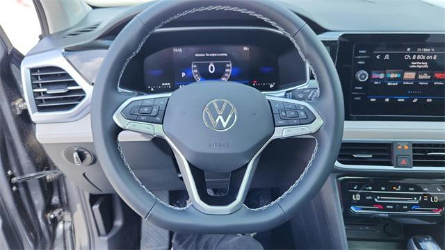 new 2025 Volkswagen Taos car, priced at $28,722