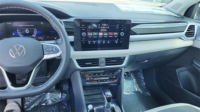 new 2025 Volkswagen Taos car, priced at $28,722