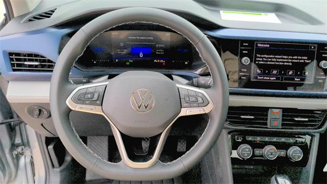 used 2024 Volkswagen Taos car, priced at $27,222
