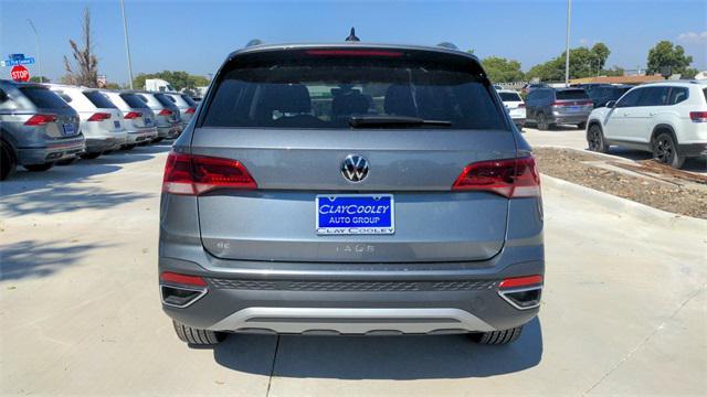 used 2024 Volkswagen Taos car, priced at $25,219