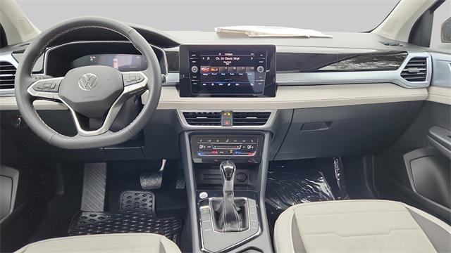 new 2025 Volkswagen Taos car, priced at $29,631