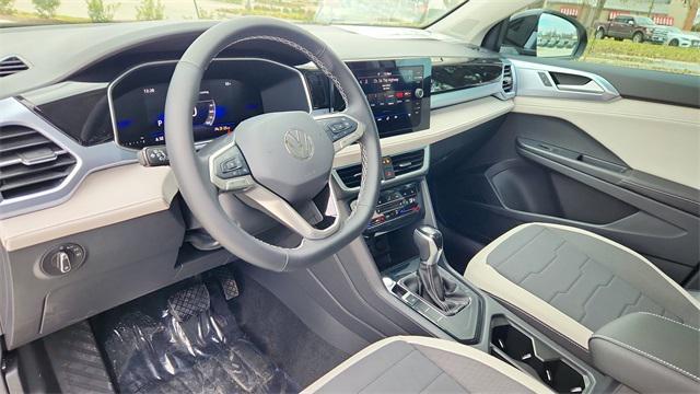 new 2025 Volkswagen Taos car, priced at $28,922