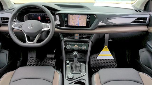 used 2022 Volkswagen Taos car, priced at $23,000