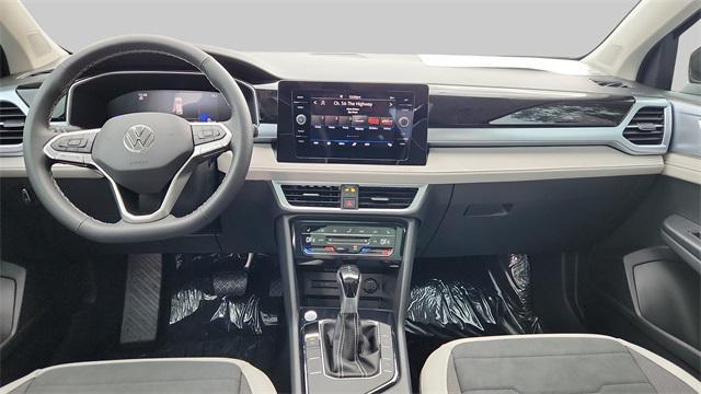 new 2025 Volkswagen Taos car, priced at $30,323