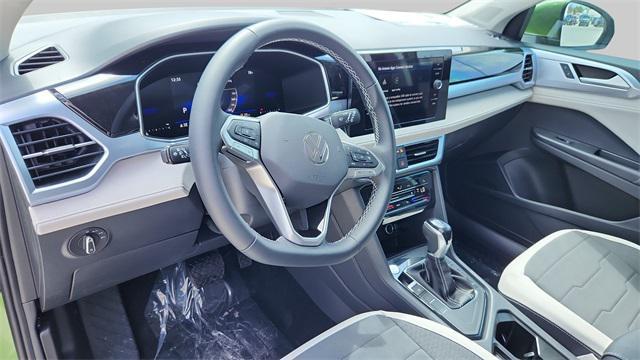 new 2025 Volkswagen Taos car, priced at $29,728
