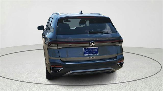new 2025 Volkswagen Taos car, priced at $30,817