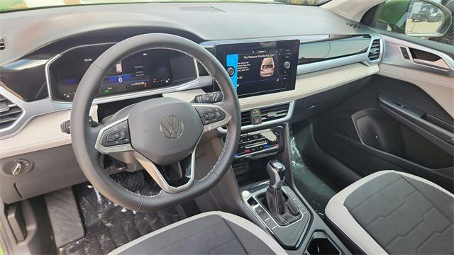 new 2025 Volkswagen Taos car, priced at $28,627