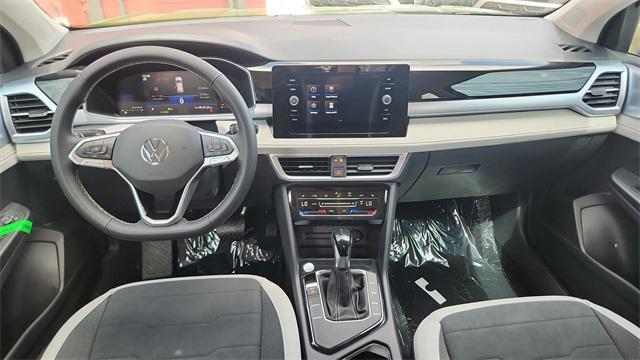 new 2025 Volkswagen Taos car, priced at $28,627