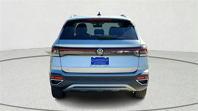 new 2025 Volkswagen Taos car, priced at $30,382