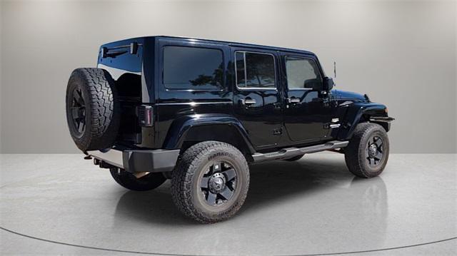 used 2013 Jeep Wrangler Unlimited car, priced at $15,767