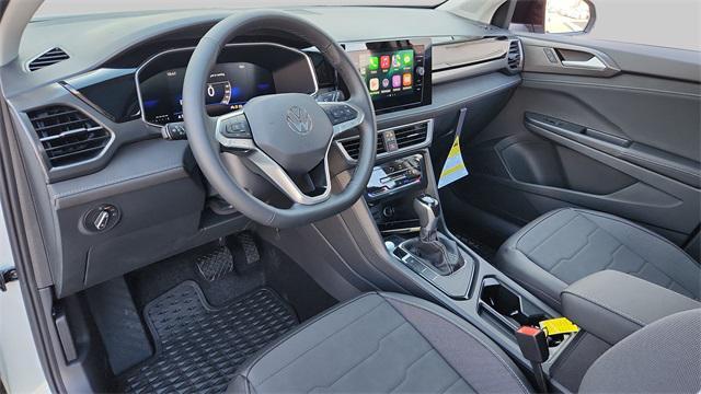 new 2025 Volkswagen Taos car, priced at $31,028