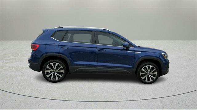 used 2023 Volkswagen Taos car, priced at $23,000