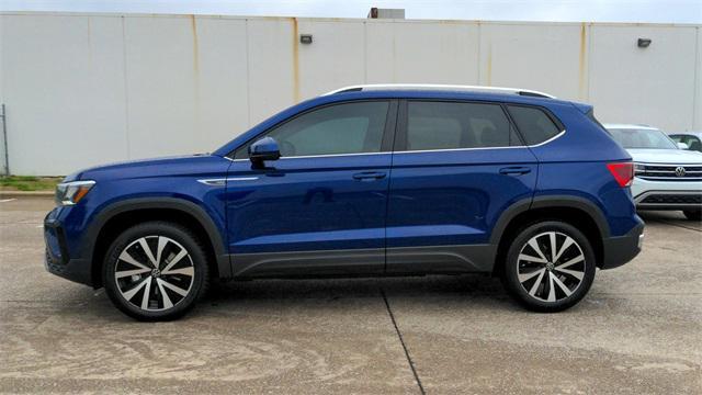 used 2023 Volkswagen Taos car, priced at $23,000