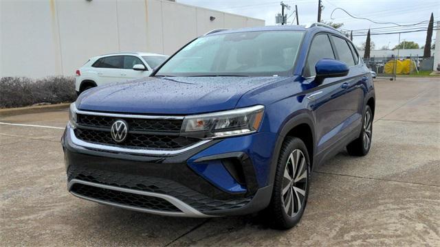 used 2023 Volkswagen Taos car, priced at $23,000
