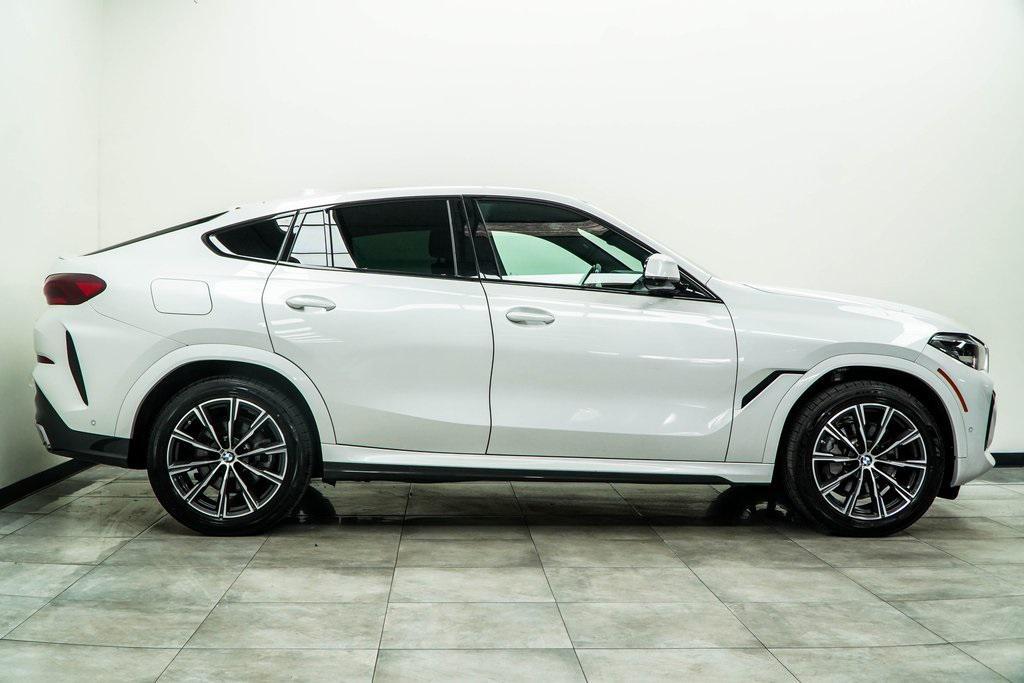 used 2023 BMW X6 car, priced at $51,625