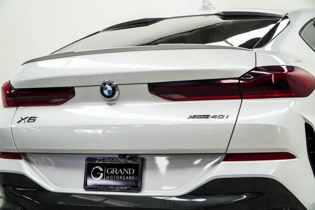 used 2023 BMW X6 car, priced at $51,625