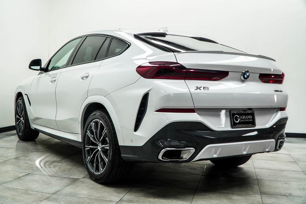 used 2023 BMW X6 car, priced at $51,625