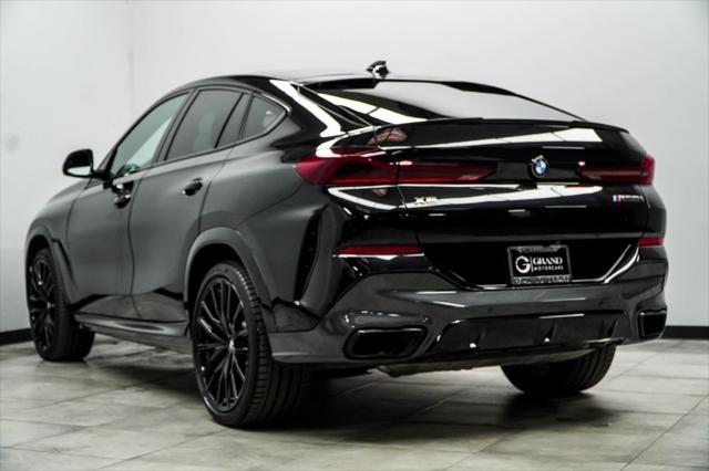 used 2022 BMW X6 car, priced at $63,485