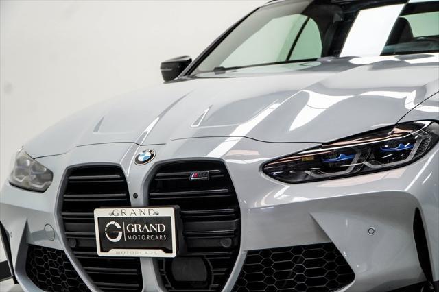 used 2022 BMW M4 car, priced at $62,381