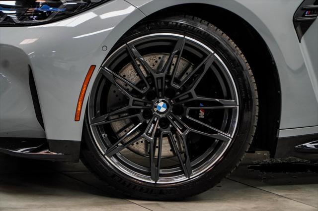 used 2022 BMW M4 car, priced at $62,381