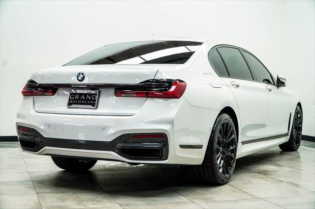 used 2022 BMW 740 car, priced at $43,591