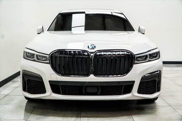 used 2022 BMW 740 car, priced at $43,591
