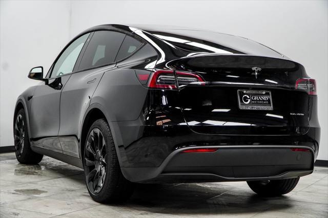 used 2023 Tesla Model Y car, priced at $34,835