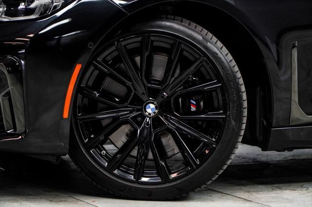 used 2022 BMW 740 car, priced at $47,665