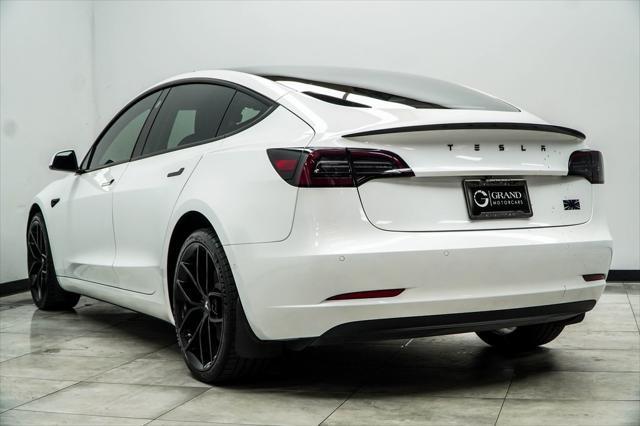 used 2022 Tesla Model 3 car, priced at $28,996