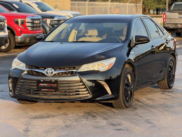 used 2015 Toyota Camry Hybrid car, priced at $6,000