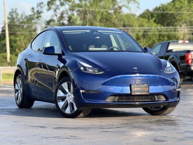 used 2024 Tesla Model Y car, priced at $35,900