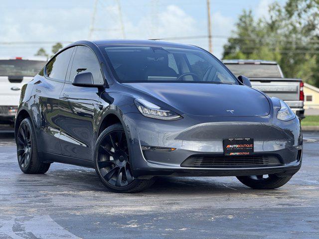 used 2023 Tesla Model Y car, priced at $28,300