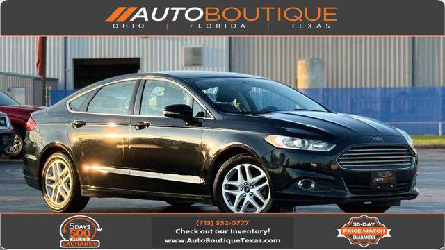 used 2014 Ford Fusion car, priced at $5,600