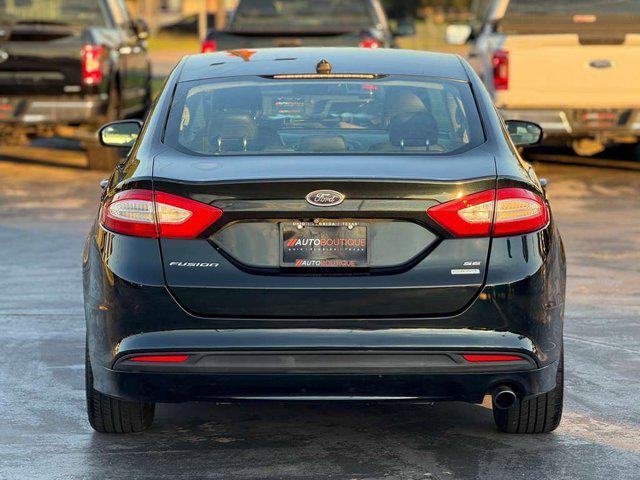 used 2014 Ford Fusion car, priced at $6,800