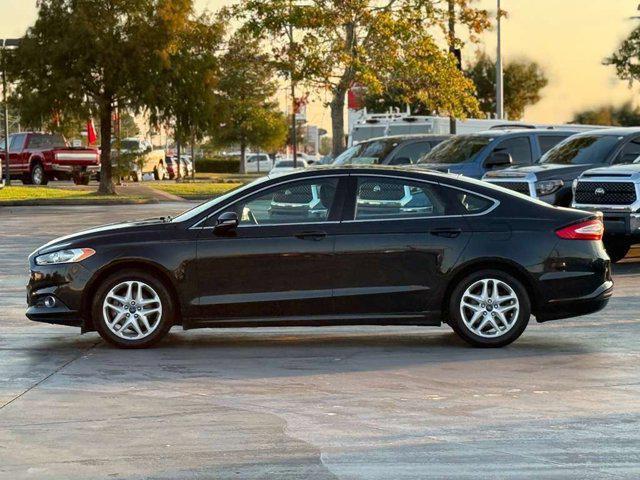used 2014 Ford Fusion car, priced at $6,800