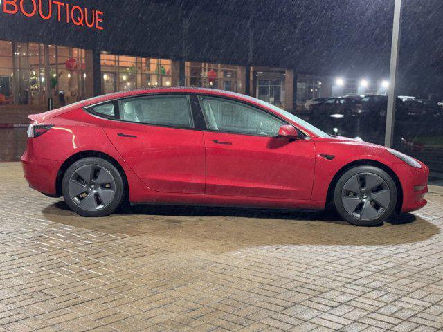 used 2023 Tesla Model 3 car, priced at $30,900