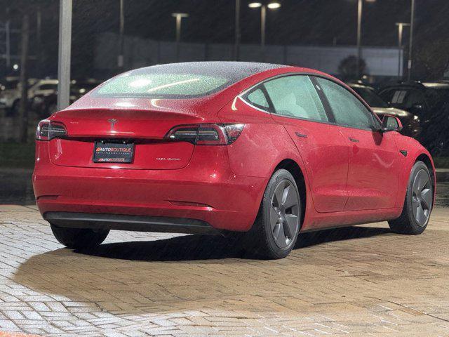 used 2023 Tesla Model 3 car, priced at $30,900