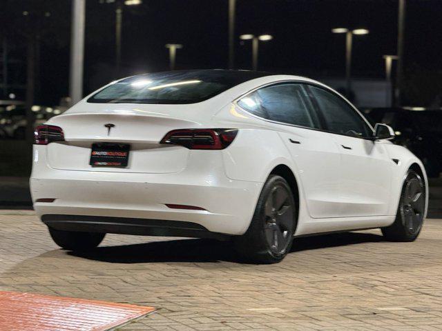 used 2023 Tesla Model 3 car, priced at $24,000