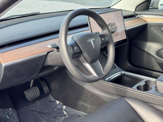 used 2023 Tesla Model 3 car, priced at $27,000