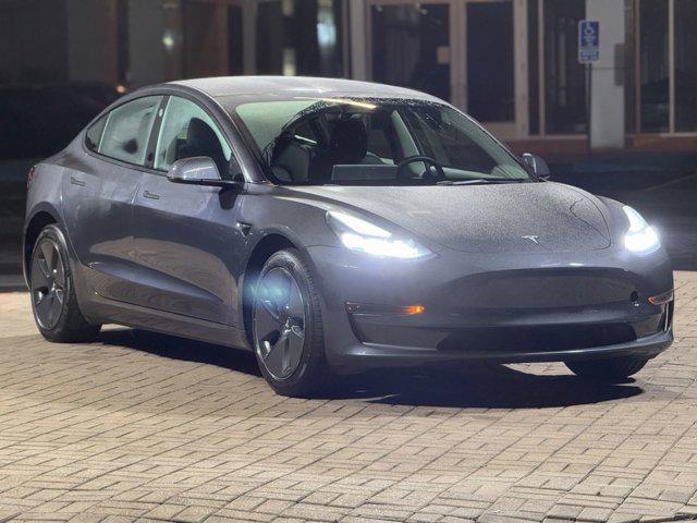 used 2023 Tesla Model 3 car, priced at $27,200