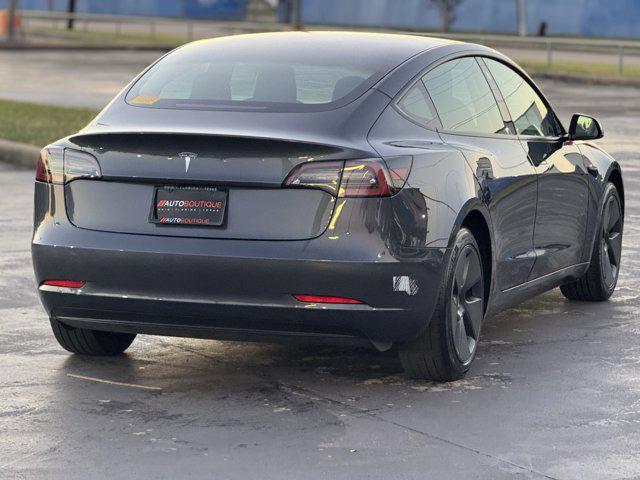 used 2023 Tesla Model 3 car, priced at $24,900